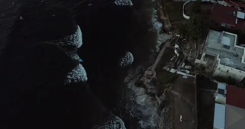 Surfing at Dusk Stock Footage 128547135