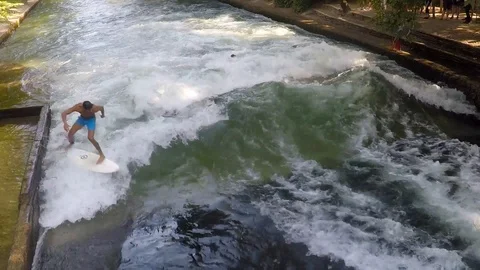 Surfing the Eisbach River in Munich, Germany Stock Footage 95388798