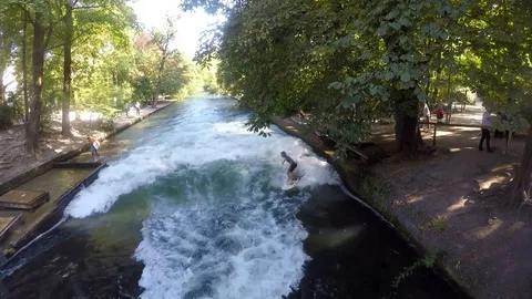 Surfing the Eisbach River in Munich, Germany Stock Footage 95388840