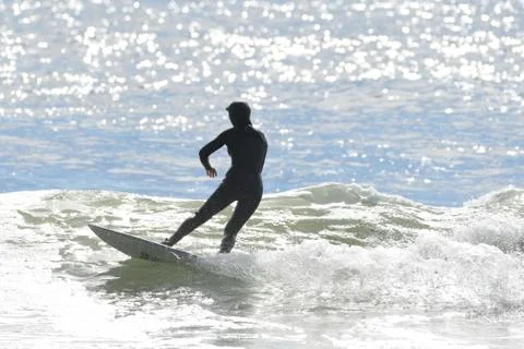 Surfing at First Beach Stock Photos