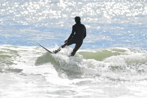 Surfing at First Beach Stock Photos