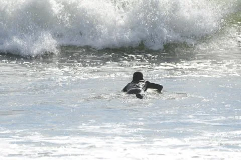 Surfing at First Beach Stock Photos