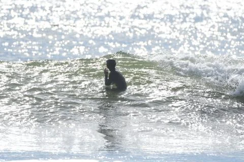 Surfing at First Beach Stock Photos