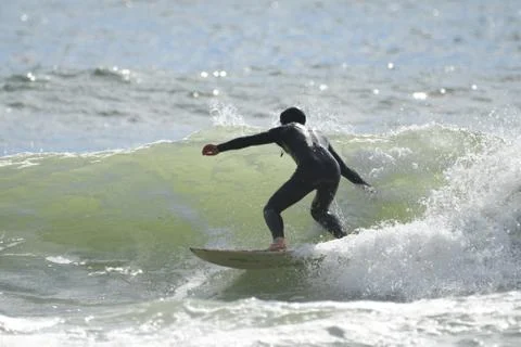 Surfing at First Beach Stock Photos