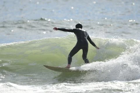 Surfing at First Beach Stock Photos