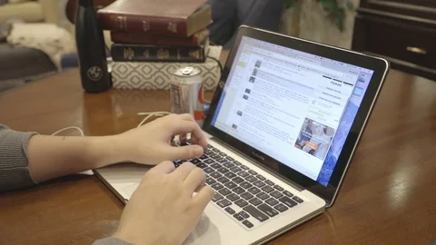 Surfing the Internet on Laptop Stock Footage 85000361