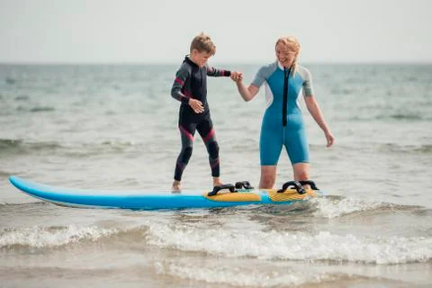 Surfing Lessons at the Beach Fotos Stock