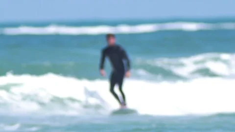 Surfing man in sea Stock Footage 74586451