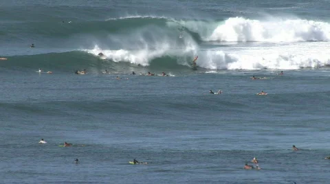 Surfing multiple big waves Maui Hawaii HD Stock Footage
