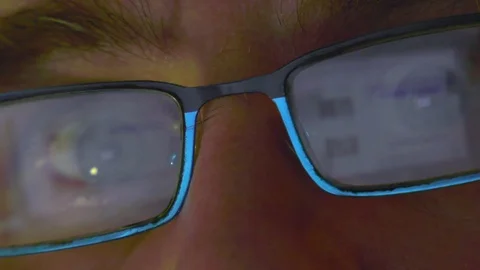 Surfing the net closeup reflection in the glasses 4K Video stock 84493061