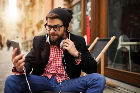 Surfing the net on the mobile Stock Photos