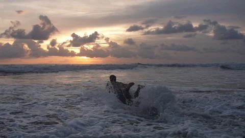 Surfing Ocean Sunset Stock Footage 73714381