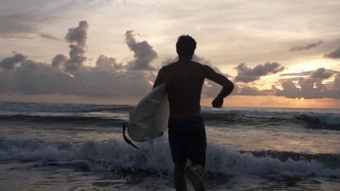 Surfing Ocean Sunset Stock Footage 73714429