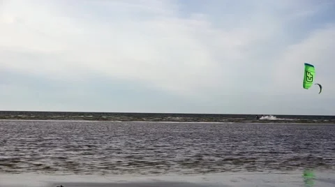 Surfing with a parachute Stock Footage 62130176