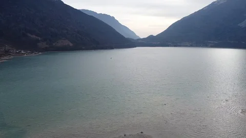 Surfing on S.Croce lake Stock Footage 124879474