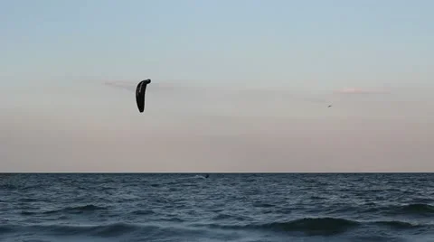 Surfing the sea before sunset Stock Footage 12274254