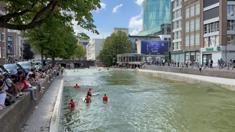 Surfing session, class in artificial surf pool at Rotterdam. Netherlands Stock Footage 315669007