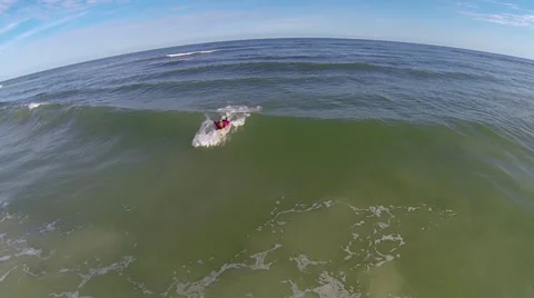 Surfing in St. Augustine Aerial  Stock Footage 33844856