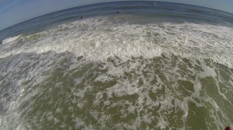 Surfing in St. Augustine FL hover over water Aerial Stock Footage 34542510