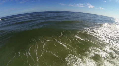 Surfing in St. Augustine FL surfers beach Aerial Stock Footage 34542514