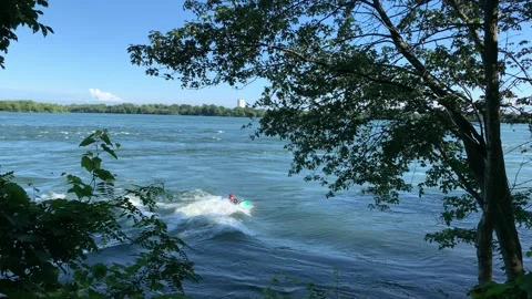 Surfing the St Lawrence River Stock Footage 297801051