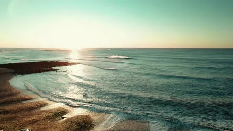 Surfing at Sunrise Video stock 187072597