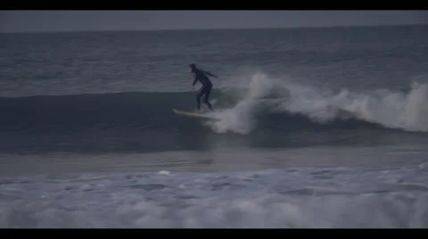 Surfing at Sunrise/Sunset 스톡 동영상 46224581