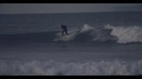 Surfing at Sunrise/Sunset 스톡 동영상 46225727