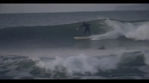 Surfing at Sunrise/Sunset 스톡 동영상 46225864