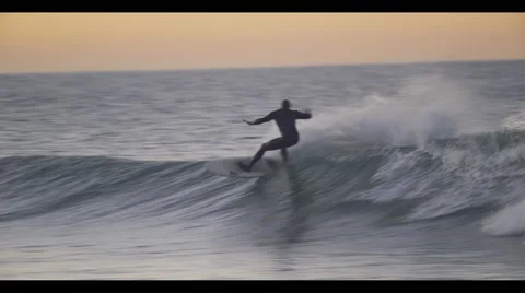 Surfing at Sunrise/Sunset 스톡 동영상 46226854