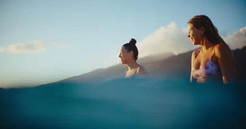 Surfing at Sunset Stock Footage 202102357