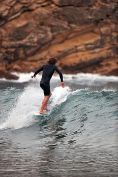 Surfing a wave - beach scenery Stock Photos