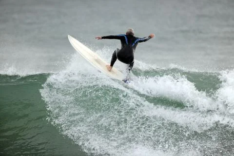 Surfing a wave - beach scenery Stock Photos