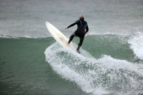 Surfing a wave - beach scenery Stock Photos