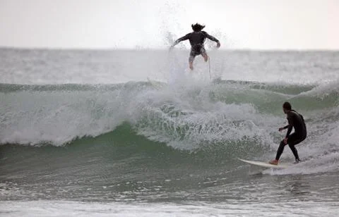 Surfing a wave - beach scenery Stock Photos