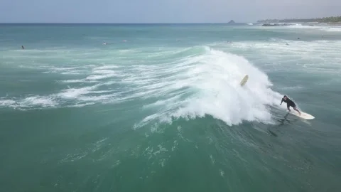Surfing wave drone perspective Stock Footage 274900139