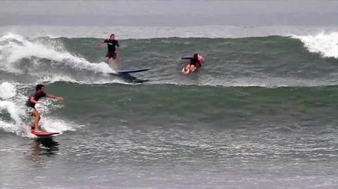 Surfing a wave Stock Footage 26317201