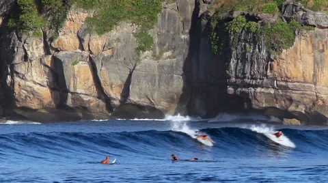 Surfing a wave Stock Footage 26322368