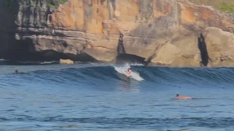 Surfing a wave. Stock Footage 43250266