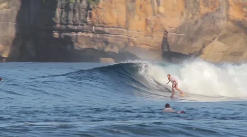 Surfing a wave. Stock Footage 43250306