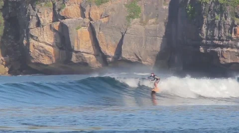 Surfing a wave. Stock Footage 43250321