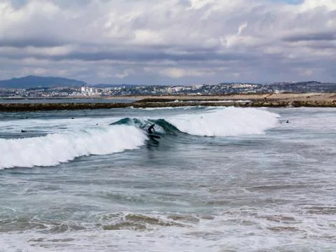 Surfing the wave. Stock Photos