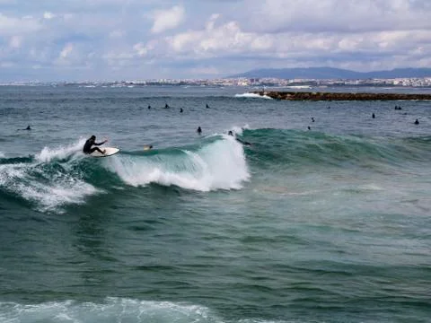 Surfing a wave. Stock Photos