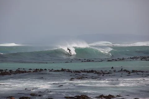 Surfing waves in the Atlantic Ocean Stock Photos