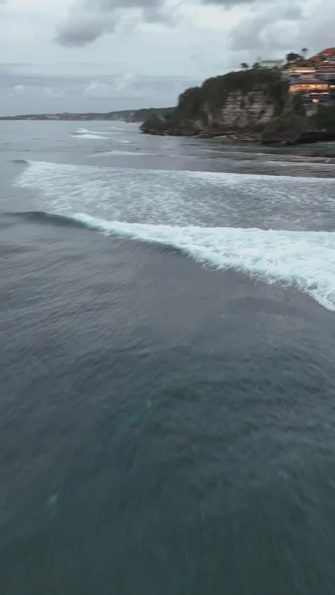 Surfing the waves in Bali Stock Footage 291109998