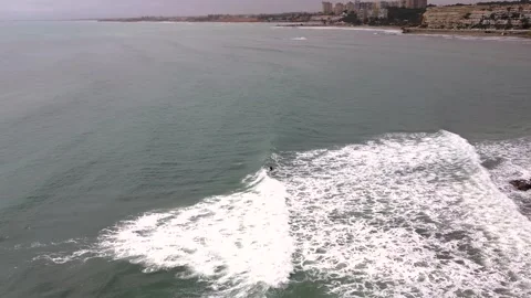 Surfing waves drone view. Seascape and sportsmen practicing surf Stock-Footage 270212986