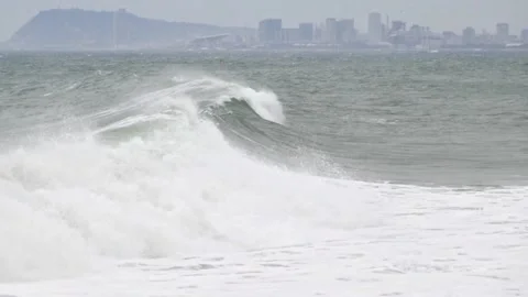Surge with big waves, strong wind and poor visibility.Two play speeds. Stock Footage 107371651