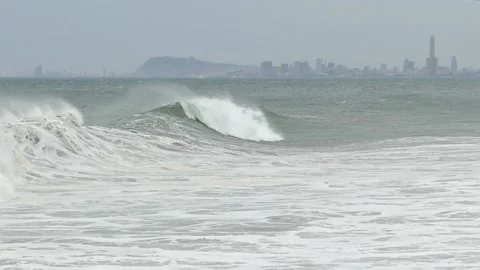 Surge with big waves, strong wind and poor visibility.Slow motion. Stock Footage 107371720