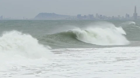 Surge with big waves, strong wind and poor visibility. Stock Footage 107377586