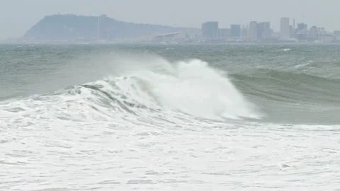 Surge with big waves, strong wind and poor visibility. Stock Footage 107377602